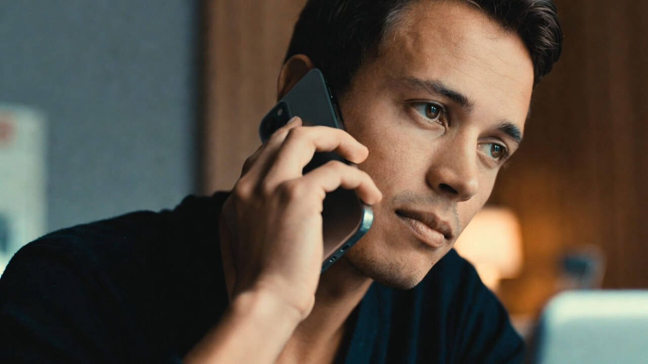 Person calmly calling their carrier to report a lost or stolen phone in 2026